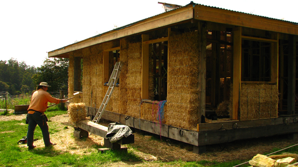 Tamping the bales into place